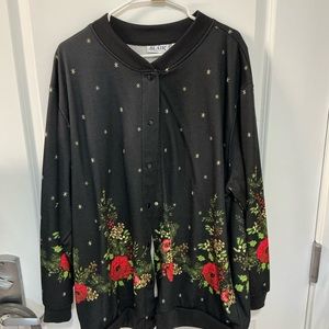 2X jacket, black with colorful design at hem.